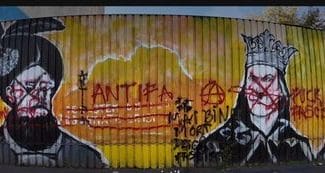 antifa-sediul-aurjpg - Știri de azi Știri de azi | George Simion afirmă că a primit peste 90 de ameninţări cu moartea şi cere protecţie din partea SPP pentru el, familia lui şi conducerea AUR / Faţada sediului central al AUR; vandalizată - Știri de azi |
